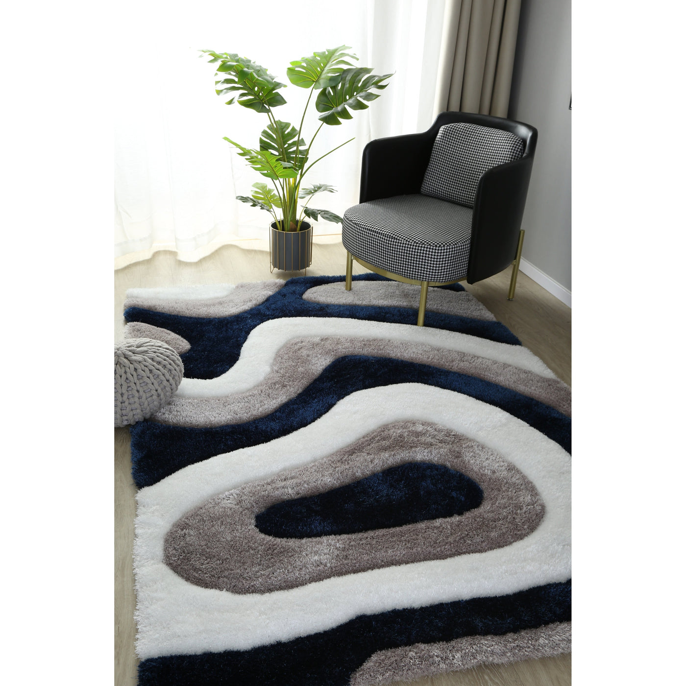 Tapis à poils longs Mateos au design abstrait