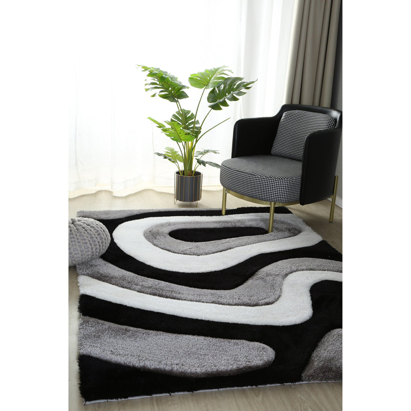 Tapis à poils longs Mateos au design abstrait