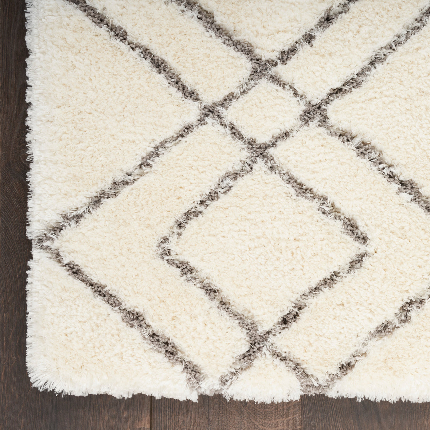 Tapis Nourison luxueux à poils longs et ultra moelleux, motif géométrique abstrait