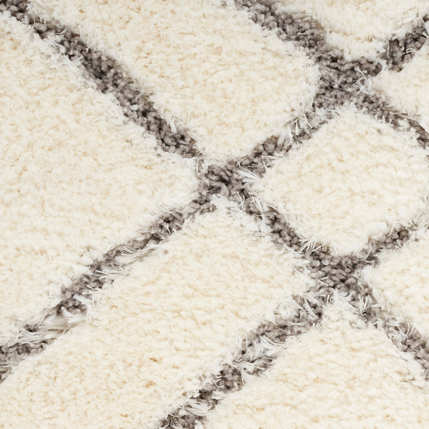 Tapis Nourison luxueux à poils longs et ultra moelleux, motif géométrique abstrait