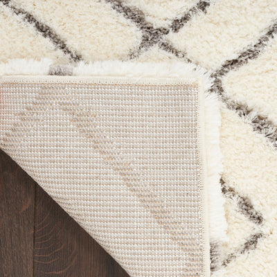 Tapis Nourison luxueux à poils longs et ultra moelleux, motif géométrique abstrait